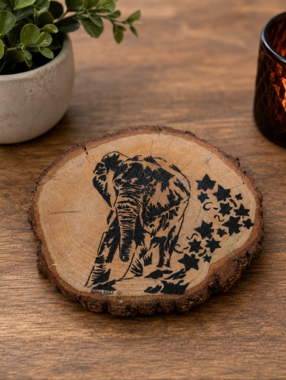 Sliced tree trunk painted shellac elephant picture